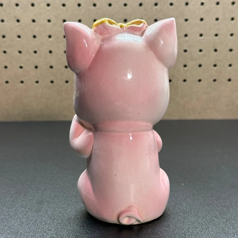 Vintage Japanese Ceramic Piggy Bank with Winking Expression And a Yellow Bow - Picture 2 of 11